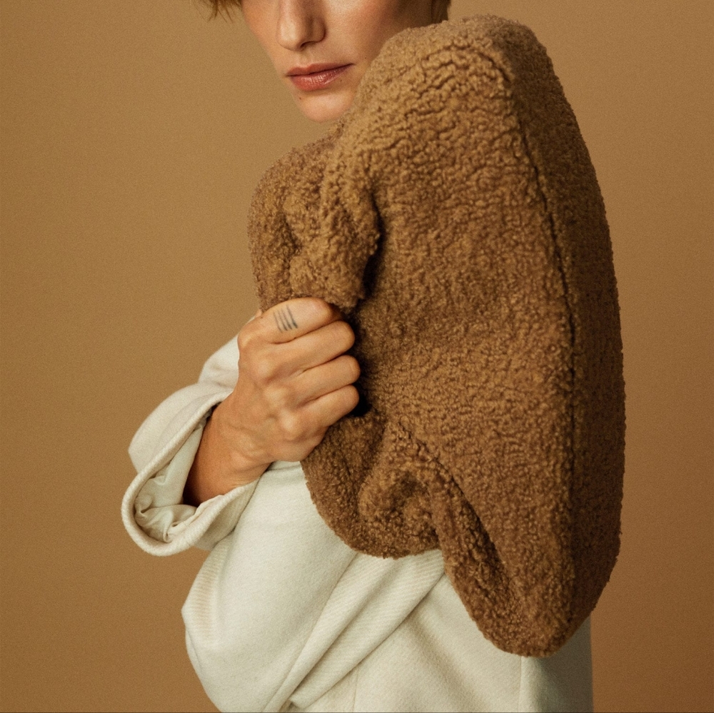 Textured faux-shearling clutch